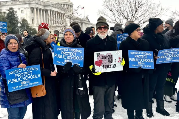 Civil workers holding signs